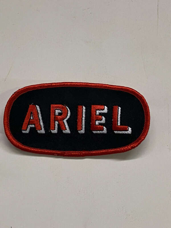 ACCESSORY: OVAL PATCH w/RED THREAD ON BLACK SILK - "ARIEL"