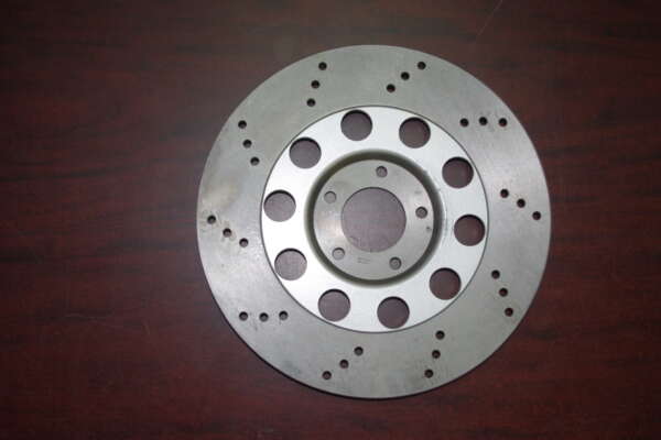 BRAKE DISC -LIGHTENED DRILL PATTERN -COMMANDO MK3 FITS ON FRONT 1975 MODELS ONLY